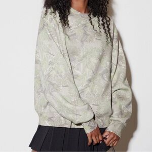 Green and white camouflage crewneck